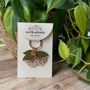 Wit & Whistle enamel keychain